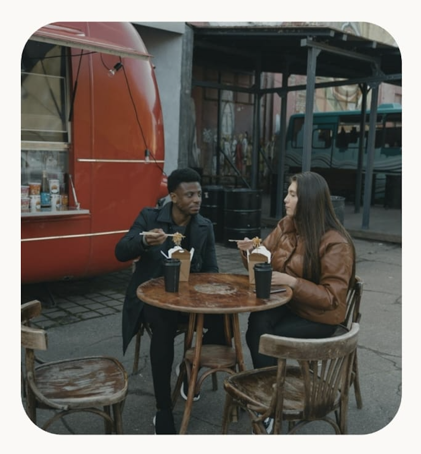 Relaxed shared meal outdoors